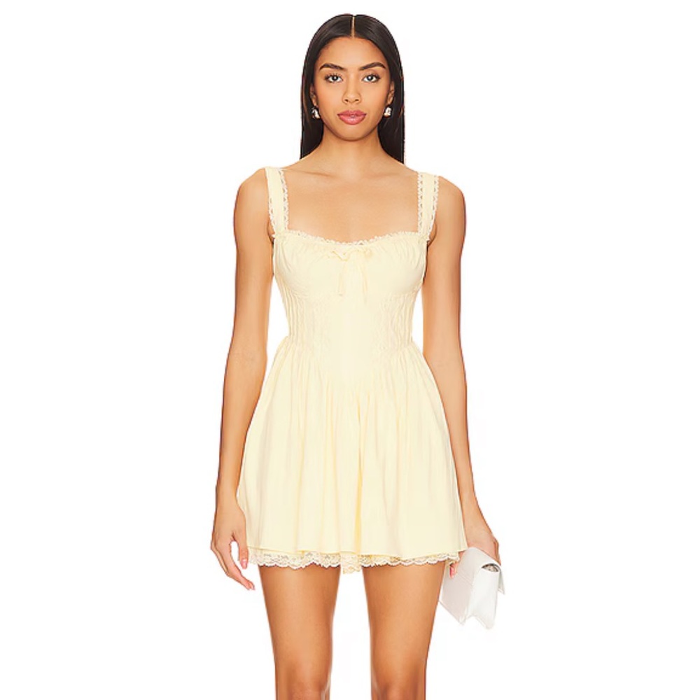 More to Come yellow Smocked Top.